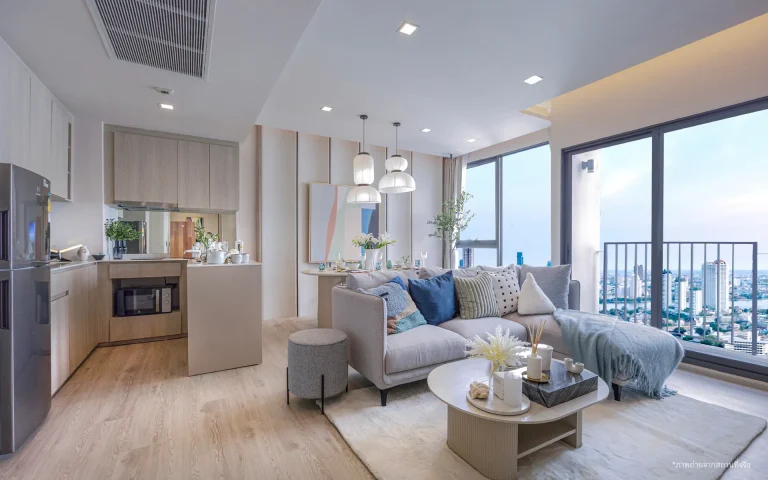 Reference Sathorn - Wongwianyai 2 bedroom unit type living room with balcony and city view
