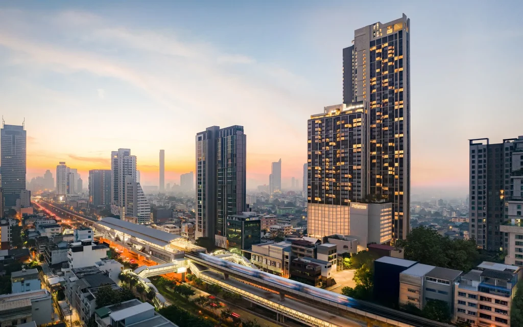 Reference Sathorn - Wongwianyai luxury condominium building next to BTS Wongwian Yai station at sunset